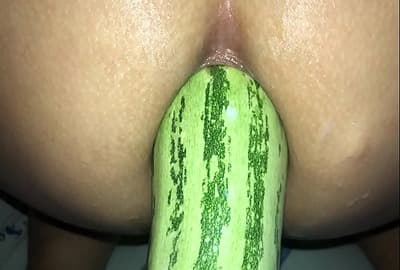 Desi sex in a large cucumber in her.